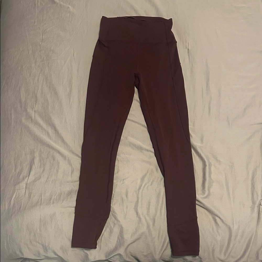 Great used condition Maroon Lululemon In Movement Tight leggings 25” size 4